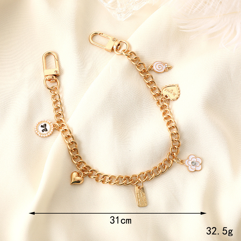 Yilian's new small fragrance hand-held chain, phone case, keychain, rope, wrist style bag, hanging chain to prevent loss