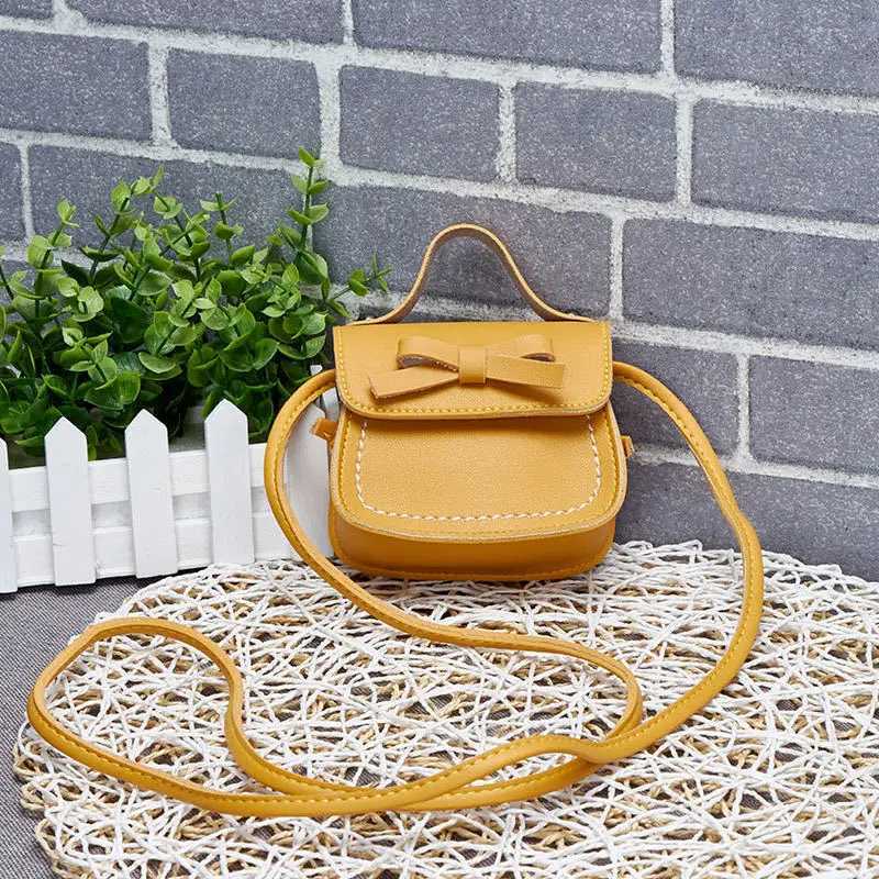 2021 Childrens Bow Cross Bag Fashion Cute Girl Mini Coin Wallet Fashion Pu Leather Handbag W240906