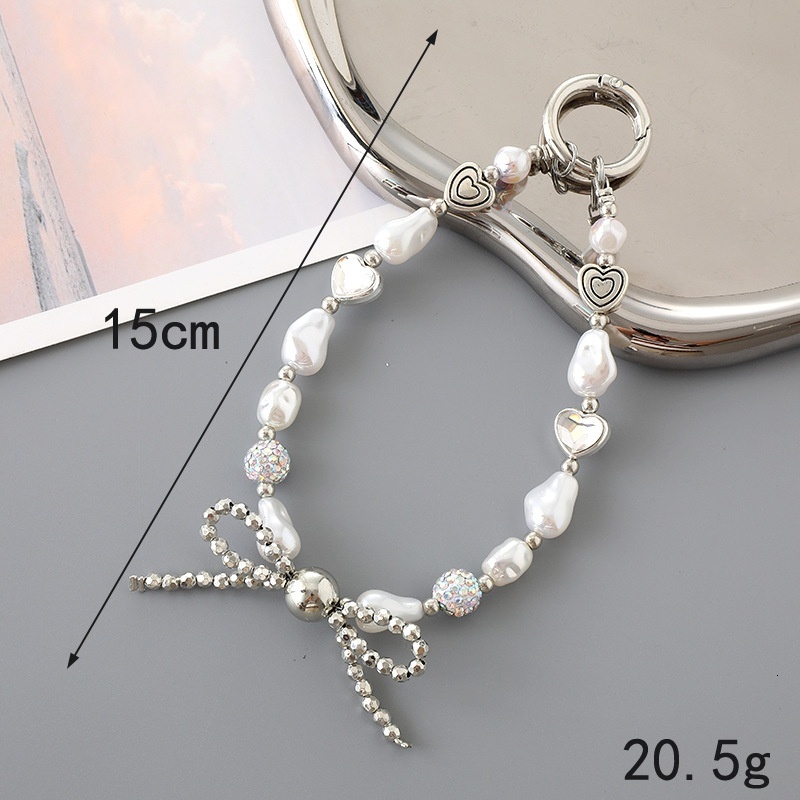 Ins new pearl bow bead case keychain pendant wrist strap phone lanyard accessory