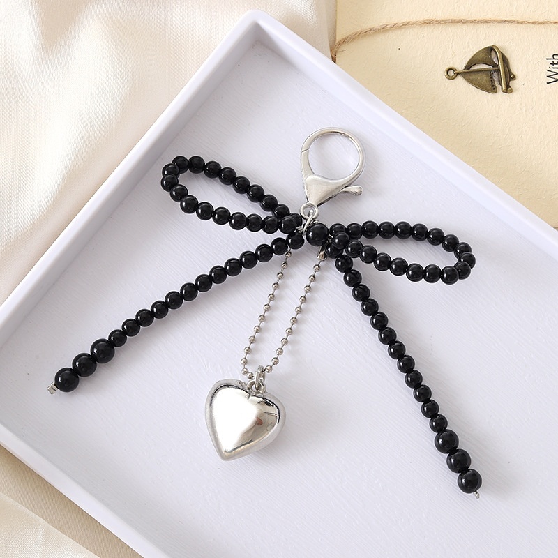 New creative and personalized pearl bow pendant bag, phone case, keychain pendant, exquisite small gift accessory