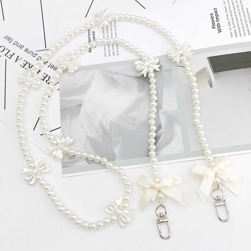 Yilian Jewelry New Pearl Bow Diagonal Cross Small Fragrant Wind Hanging Phone Case Pendant Single Shoulder Back Chain Female