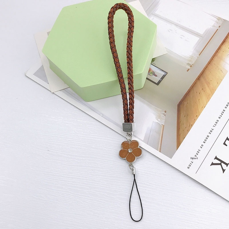 Creative leather lanyard bracelet, new woven mobile phone chain, camellia flower plum blossom short hand rope