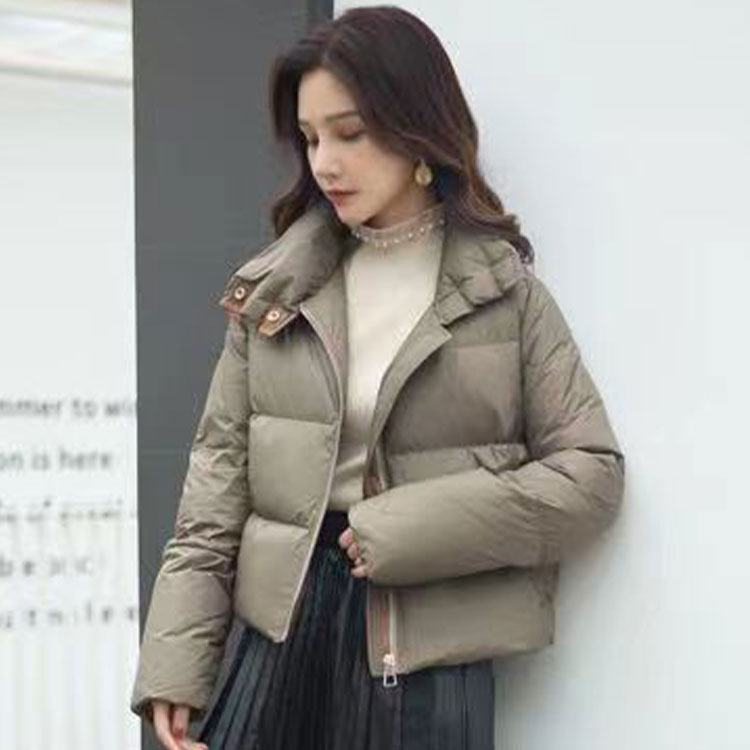 Elegant designer white coats provide quality duck down padding for cold weather
