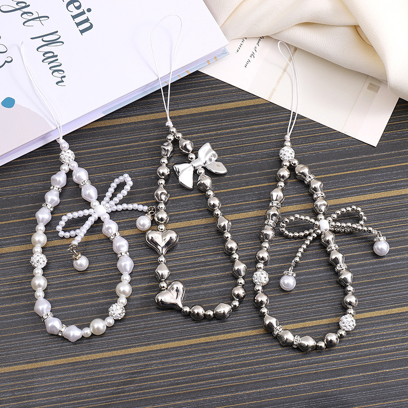 Creative new pearl bow chain, phone case, keychain, hanging rope, CCD camera, beaded pendant