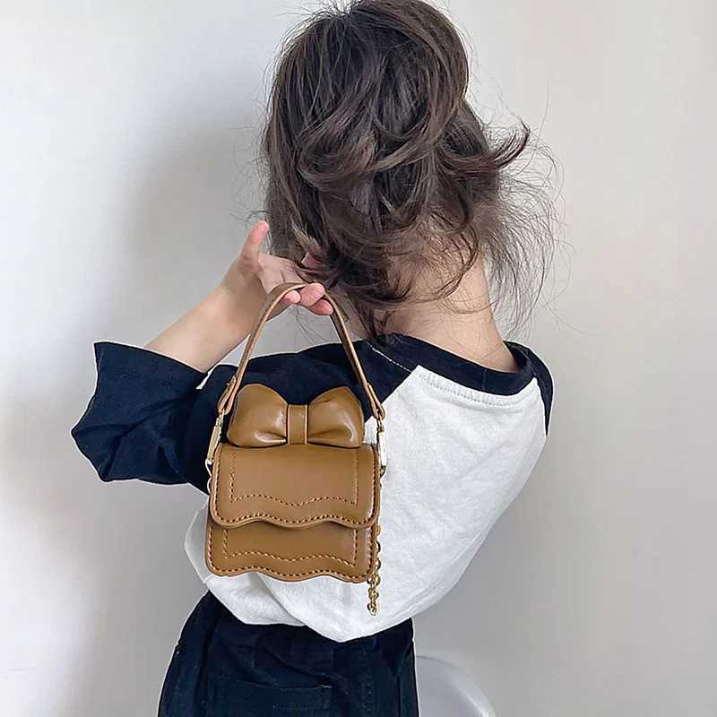 Fashionable childrens cross shaped bag cute cartoon bow foreign style baby coin purse mini girl princess bag W240906