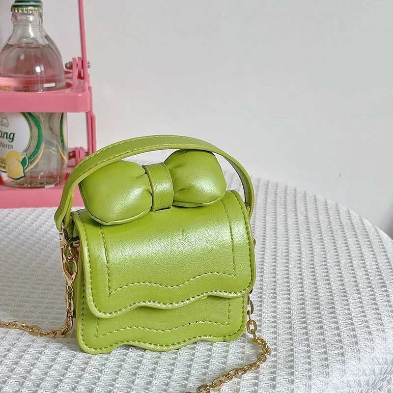 Fashionable childrens cross shaped bag cute cartoon bow foreign style baby coin purse mini girl princess bag W240906
