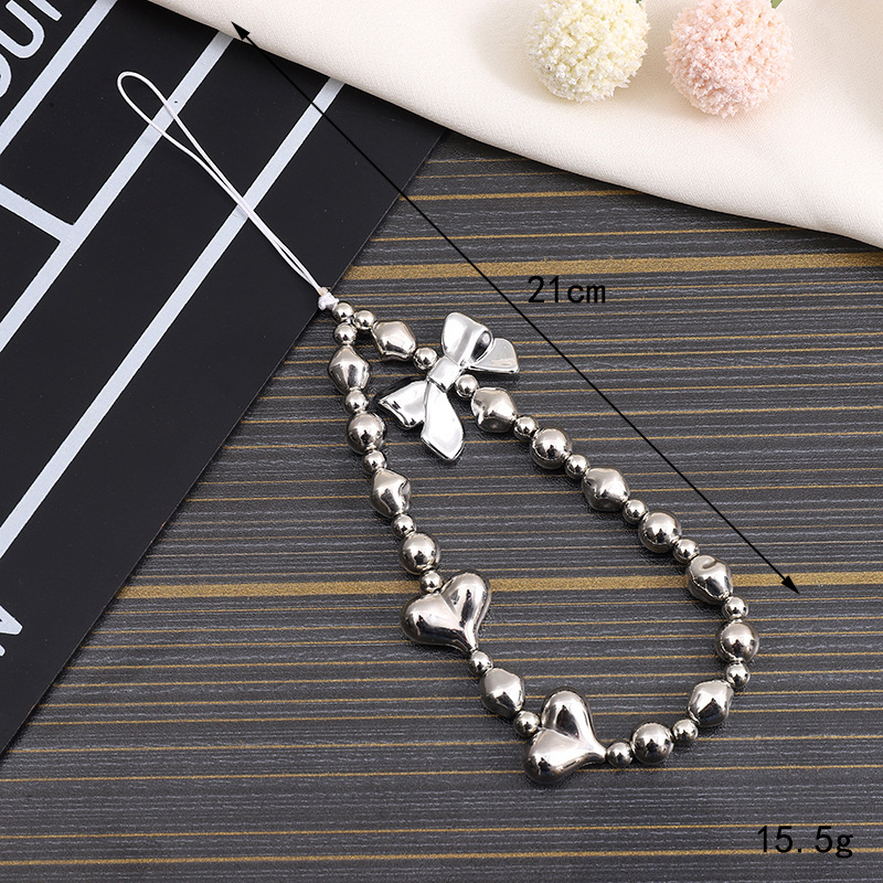 Creative new pearl bow chain, phone case, keychain, hanging rope, CCD camera, beaded pendant