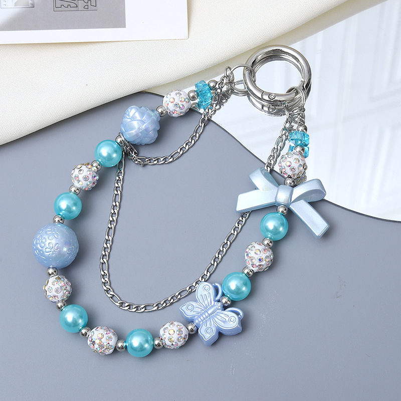 Creative new acrylic love bow double chain diamond ball mobile phone lanyard luggage keychain pendant