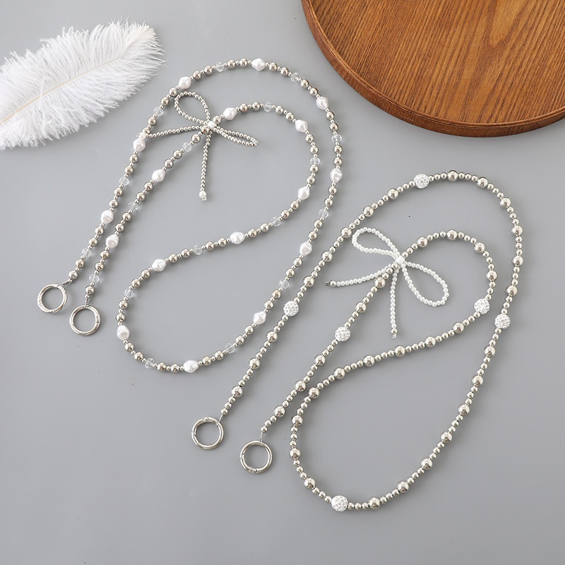 Creative new mobile lanyard, pearl bow, bead string, crossbody luggage accessories, phone case, chain pendant