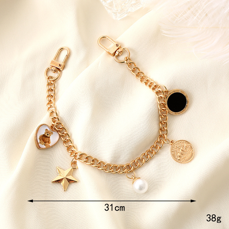 Yilian's new small fragrance hand-held chain, phone case, keychain, rope, wrist style bag, hanging chain to prevent loss