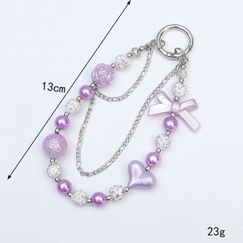 Creative new acrylic love bow double chain diamond ball mobile phone lanyard luggage keychain pendant