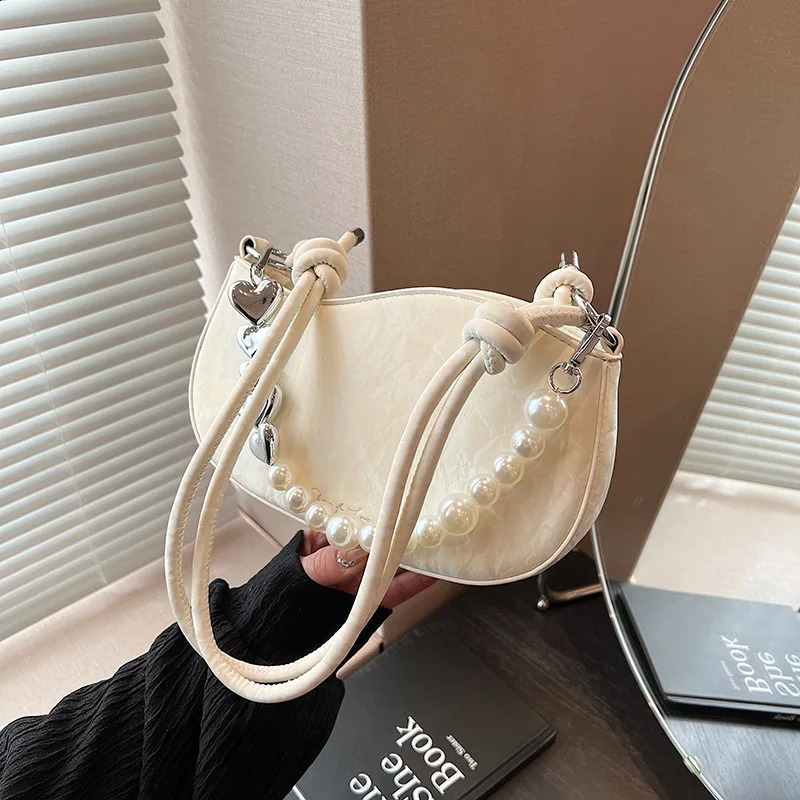 Niche Small Bag Womens 2024 Spring Trend Versatile Small Square Bag Fashion Pearl Wave Shoulder Support Handbag 240904
