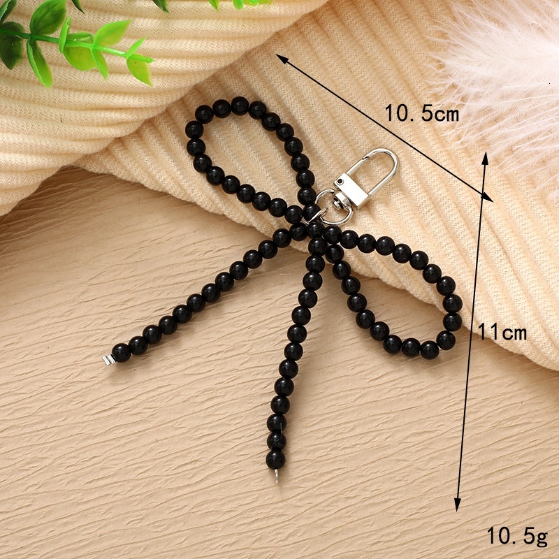 New creative and personalized pearl bow pendant bag, phone case, keychain pendant, exquisite small gift accessory