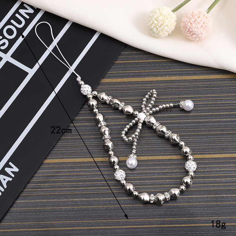 Creative new pearl bow chain, phone case, keychain, hanging rope, CCD camera, beaded pendant