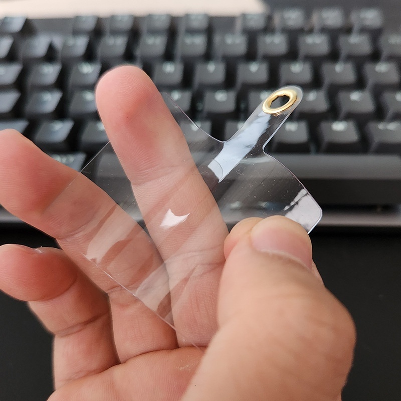 Yilian new gasket transparent patch PVC phone case universal back strap rope diagonal clip hanging piece