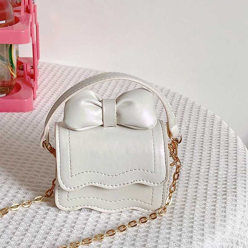 Fashionable childrens cross shaped bag cute cartoon bow foreign style baby coin purse mini girl princess bag W240906