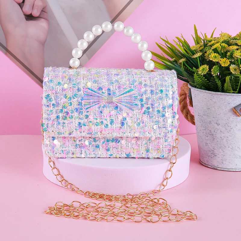 2024 New Girl Mini Wallet Cute Laser Bow Childrens Princess Cross Body Bag Childrens Day Baby Pearl Handbag W240906