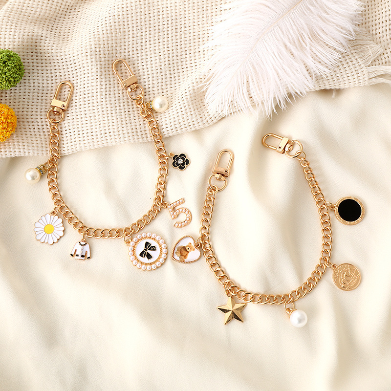 Yilian's new small fragrance hand-held chain, phone case, keychain, rope, wrist style bag, hanging chain to prevent loss