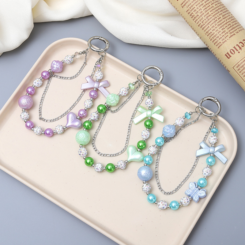 Creative new acrylic love bow double chain diamond ball mobile phone lanyard luggage keychain pendant