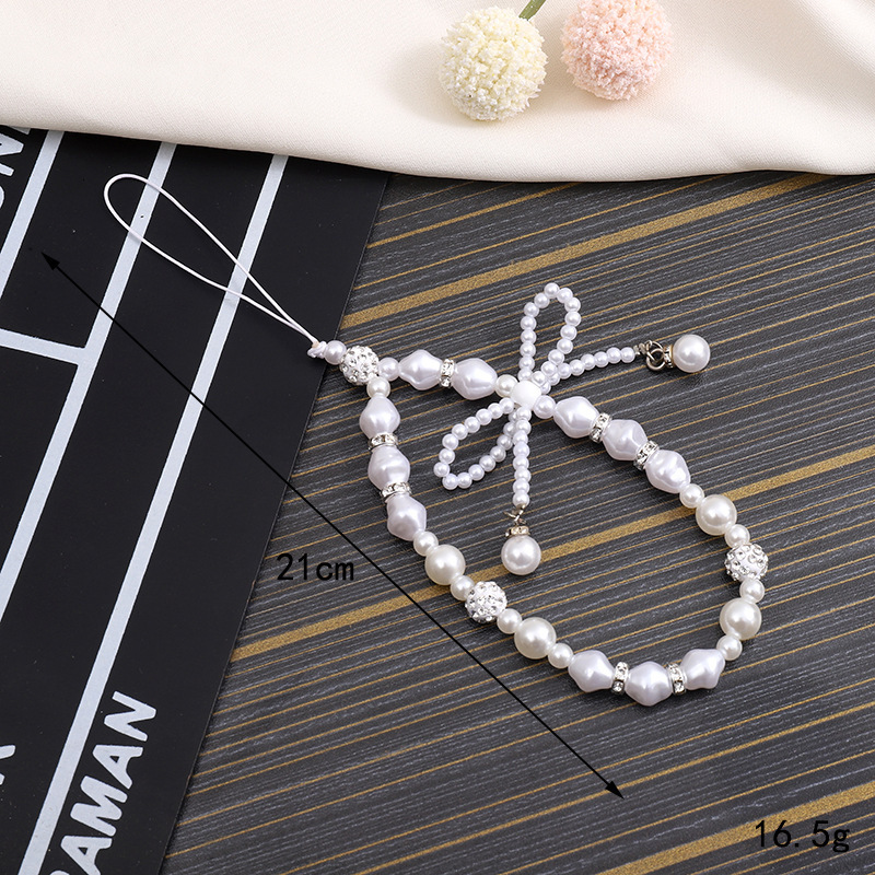 Creative new pearl bow chain, phone case, keychain, hanging rope, CCD camera, beaded pendant