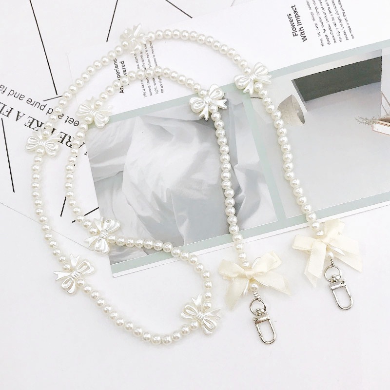 Yilian Jewelry New Pearl Bow Diagonal Cross Small Fragrant Wind Hanging Phone Case Pendant Single Shoulder Back Chain Female