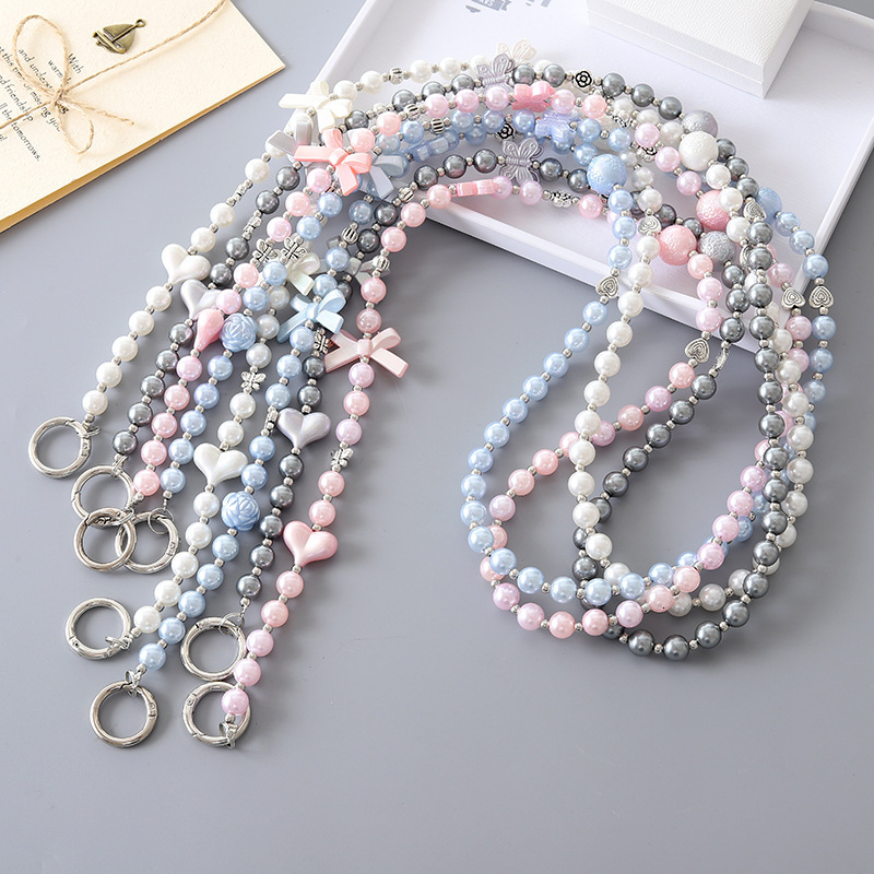 New pearl love bow crossbody chain, luggage keychain pendant, long phone hanging rope, can be carried and anti lost rope