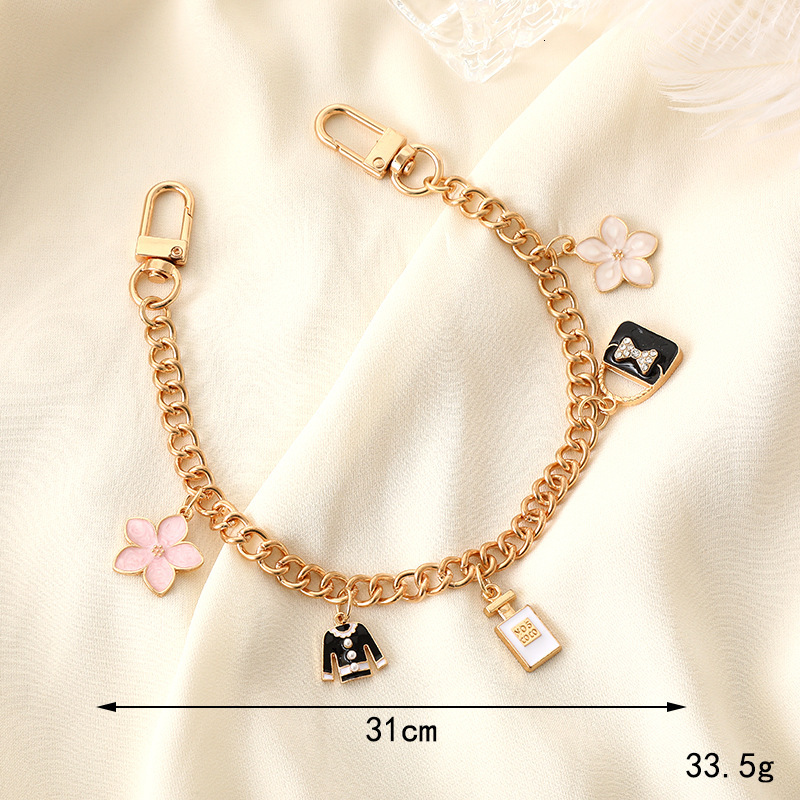 Yilian's new small fragrance hand-held chain, phone case, keychain, rope, wrist style bag, hanging chain to prevent loss