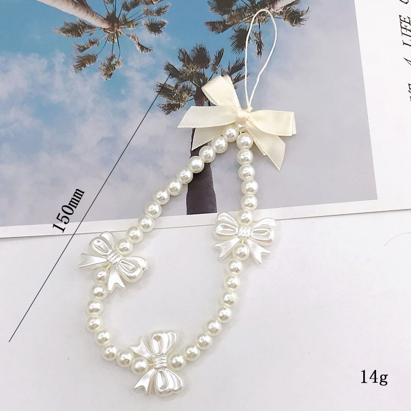 Yilian New Girl Heart Pearl Bow Hanging Rope Handmade Beaded Phone Chain Short USB Pendant for Women