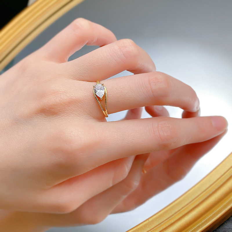 Infinity Pear Cut Moissanite Band Ring in Sterg Sier