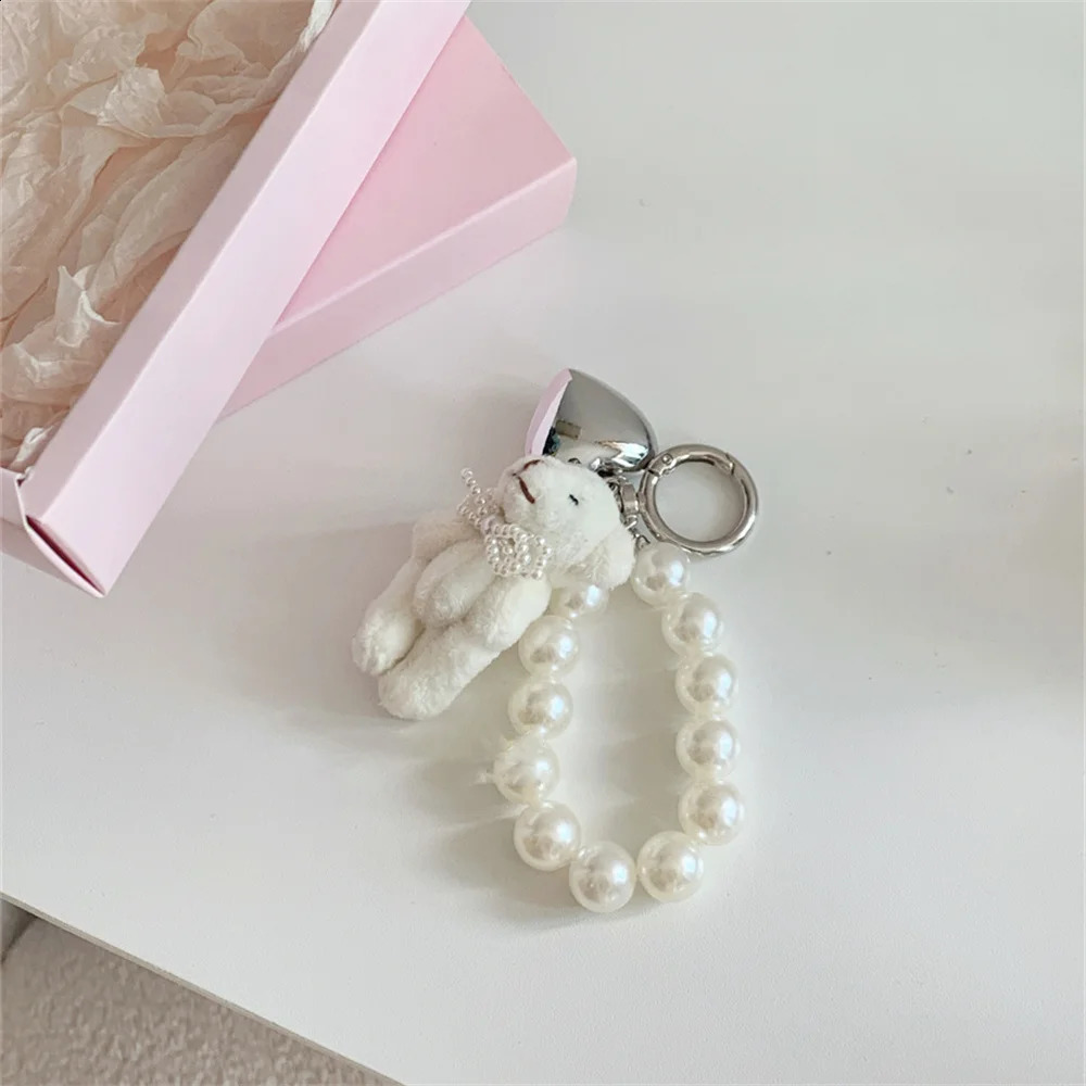 Korean cute fluffy teddy bear pearl bow pendant keychain used for car keys iPhone accessories fashionable heart-shaped keychains womens handbags 24091