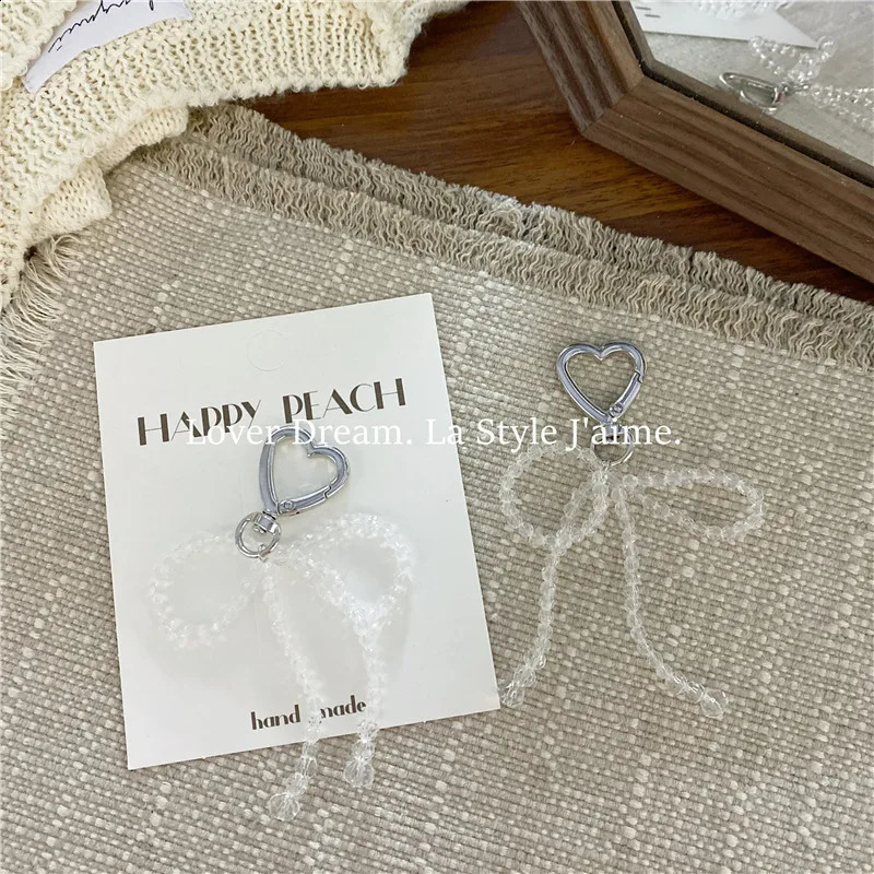 1piece fashionable korean sweet money bag womens transparent bow heartshaped pendant keychain charm wallet accessories 240910 zhanyishengli