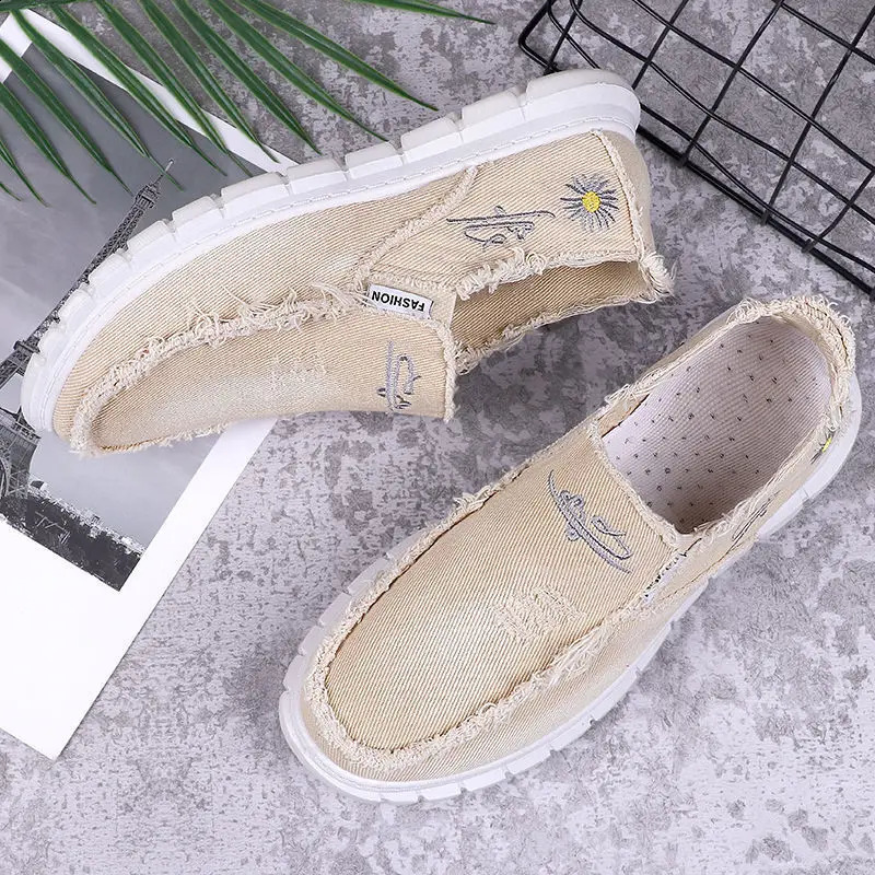 Mens spring casual shoes fashionable canvas shoes breathable and comfortable flat bottom lazy shoes Zapatos De Hombre 240909