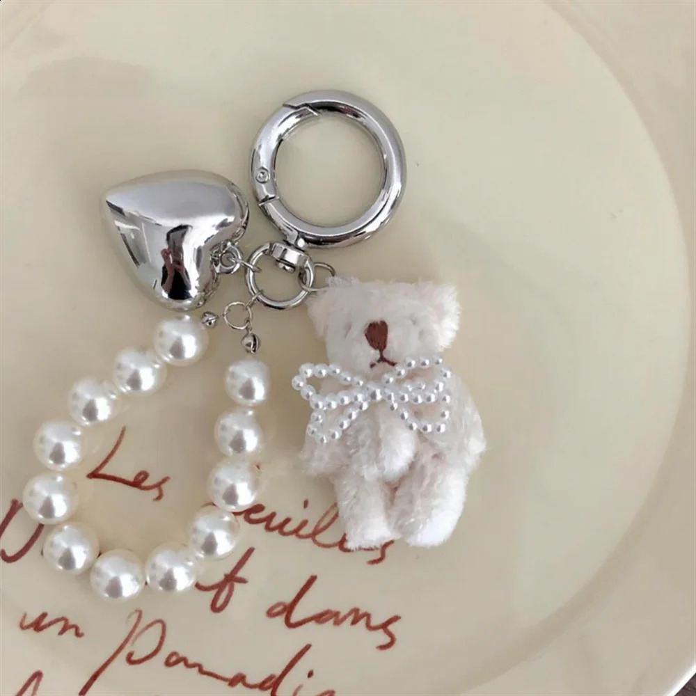 Korean cute fluffy teddy bear pearl bow pendant keychain used for car keys iPhone accessories fashionable heart-shaped keychains womens handbags 24091