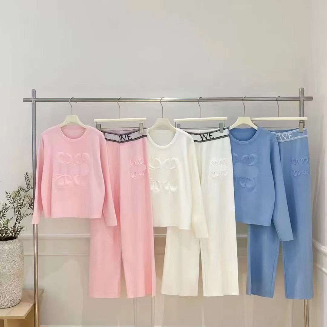 Autumn new European station fashion embossed pattern pullover round neck wide-leg pants two-piece female Joker solid color suit