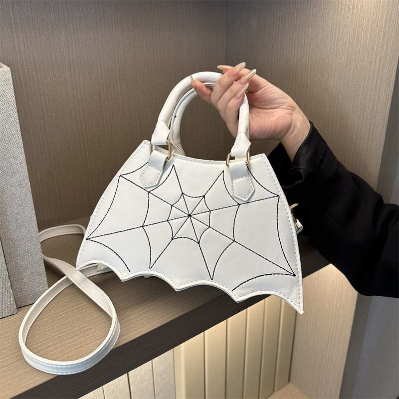 Summer new fashion spider web hand bill of lading shoulder crossbody saddle bag female bag to support a large number of wholesale mixed batch