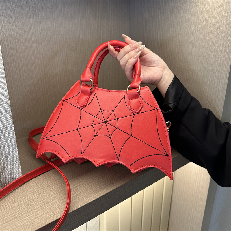 Summer new fashion spider web hand bill of lading shoulder crossbody saddle bag female bag to support a large number of wholesale mixed batch