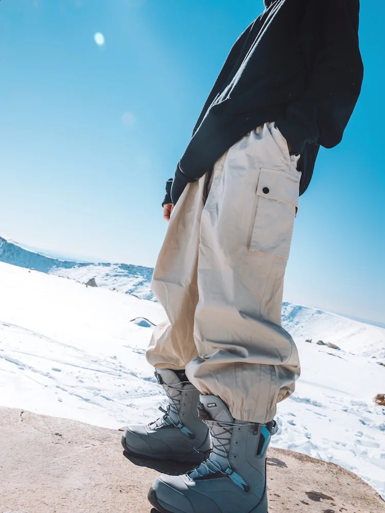 2024 mens ski bag pants warm and loose Skying Ski Trousers winter outdoor waterproof womens snowboard pants 240909