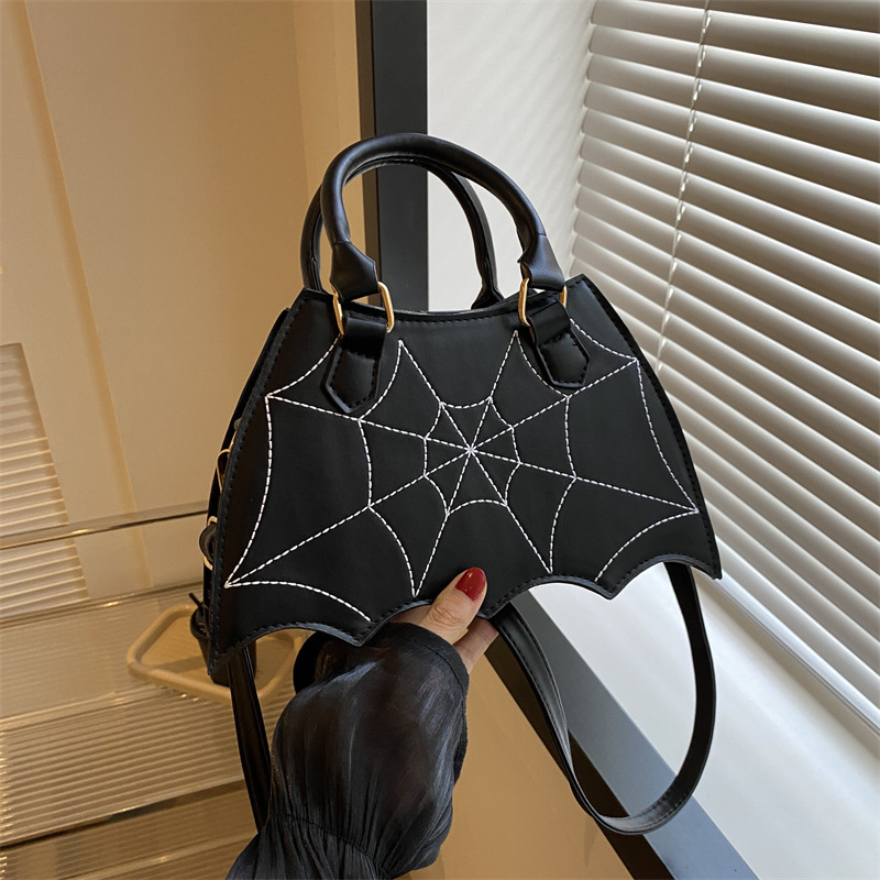 Summer new fashion spider web hand bill of lading shoulder crossbody saddle bag female bag to support a large number of wholesale mixed batch