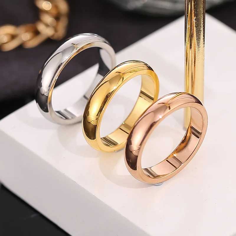 Simple luxurious gold titanium steel ring suitable for women fashion paradigms curved surfaces ordinary finger rings couple jewelry W240912