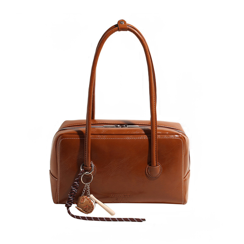 Handheld Boston for women 2024 new commuter bag, high-end texture, niche and versatile, single shoulder bag