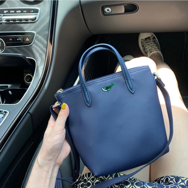 Short handled French new crocodile tote one shoulder portable dumpling mobile phone bag, mini diagonal cross women's bag