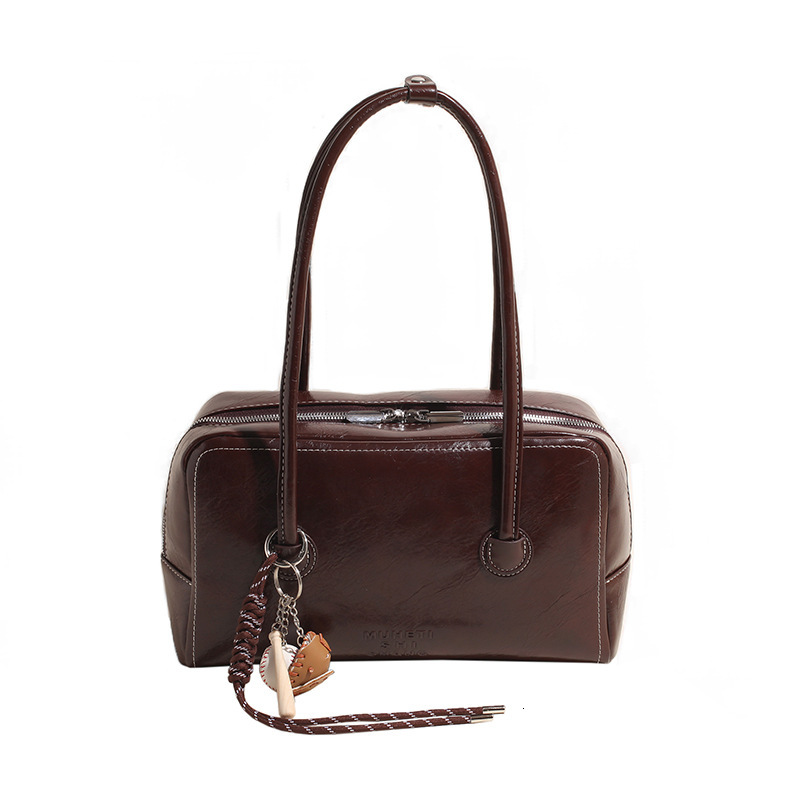Handheld Boston for women 2024 new commuter bag, high-end texture, niche and versatile, single shoulder bag