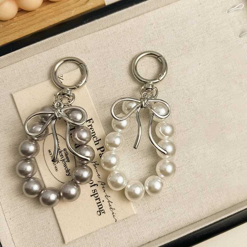 Cute pearl bow pendant suitable for women temperature bag suspension decorative accessories gifts luxury car keychain W240911