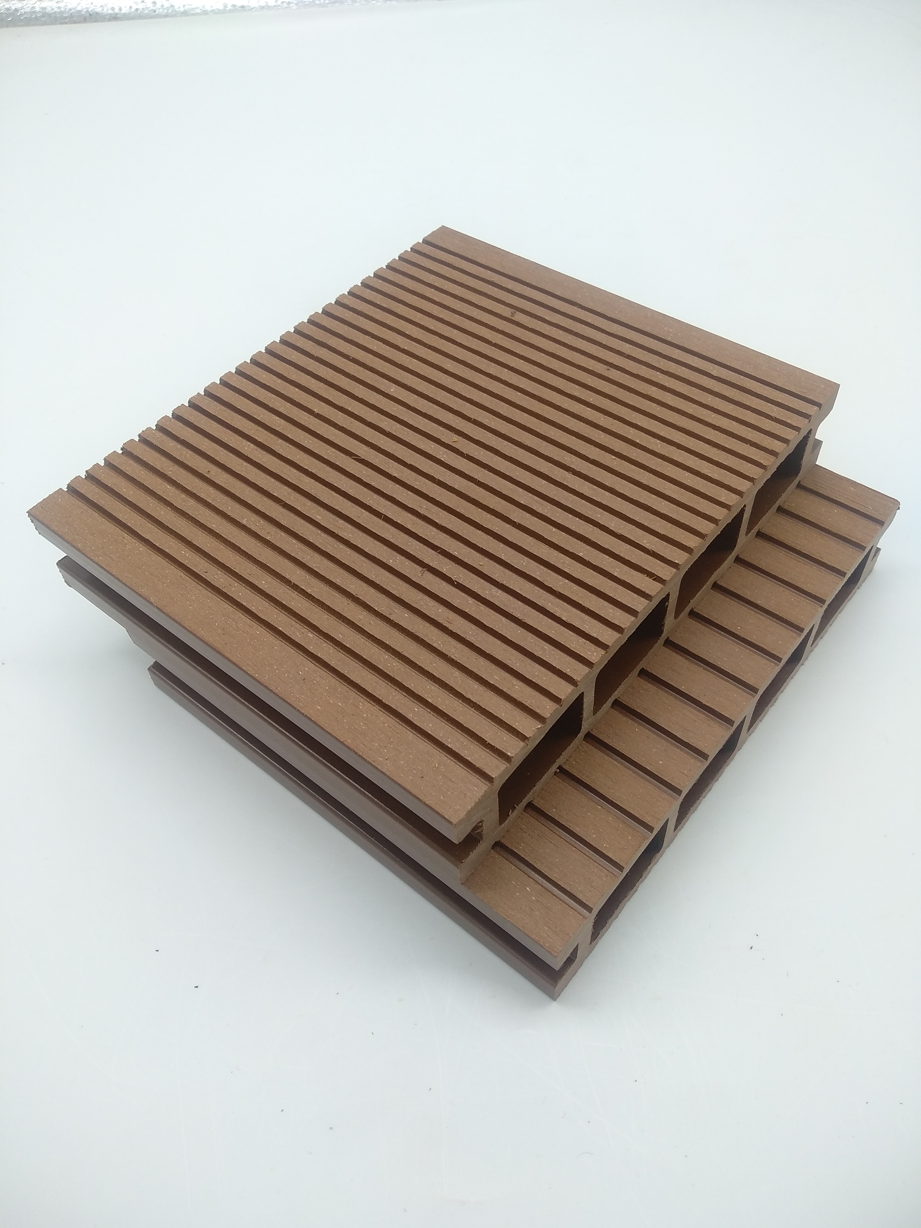 Hot outdoor waterproof striated groove square hole wood grain wood plastic flooring