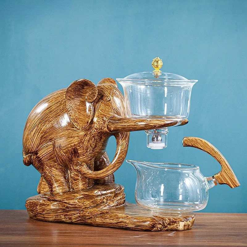 Heat resistant teapot with creative teapot base elephant shaped automatic teapot set Puer Oolong teapot and cup set X240913