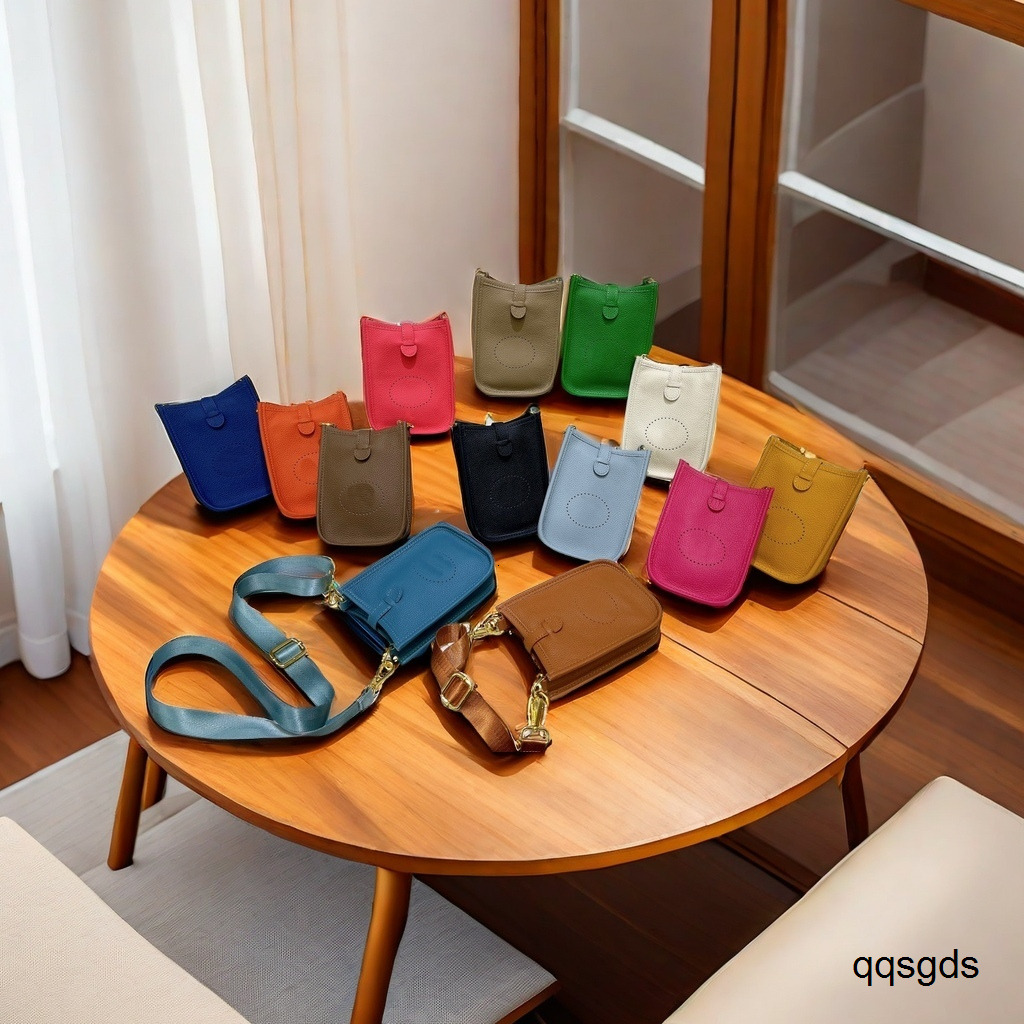 The latest high-end first layer togo cowhide bucket bag Evelyn leather womens bag Lychee pattern H hollow shoulder crossbody785