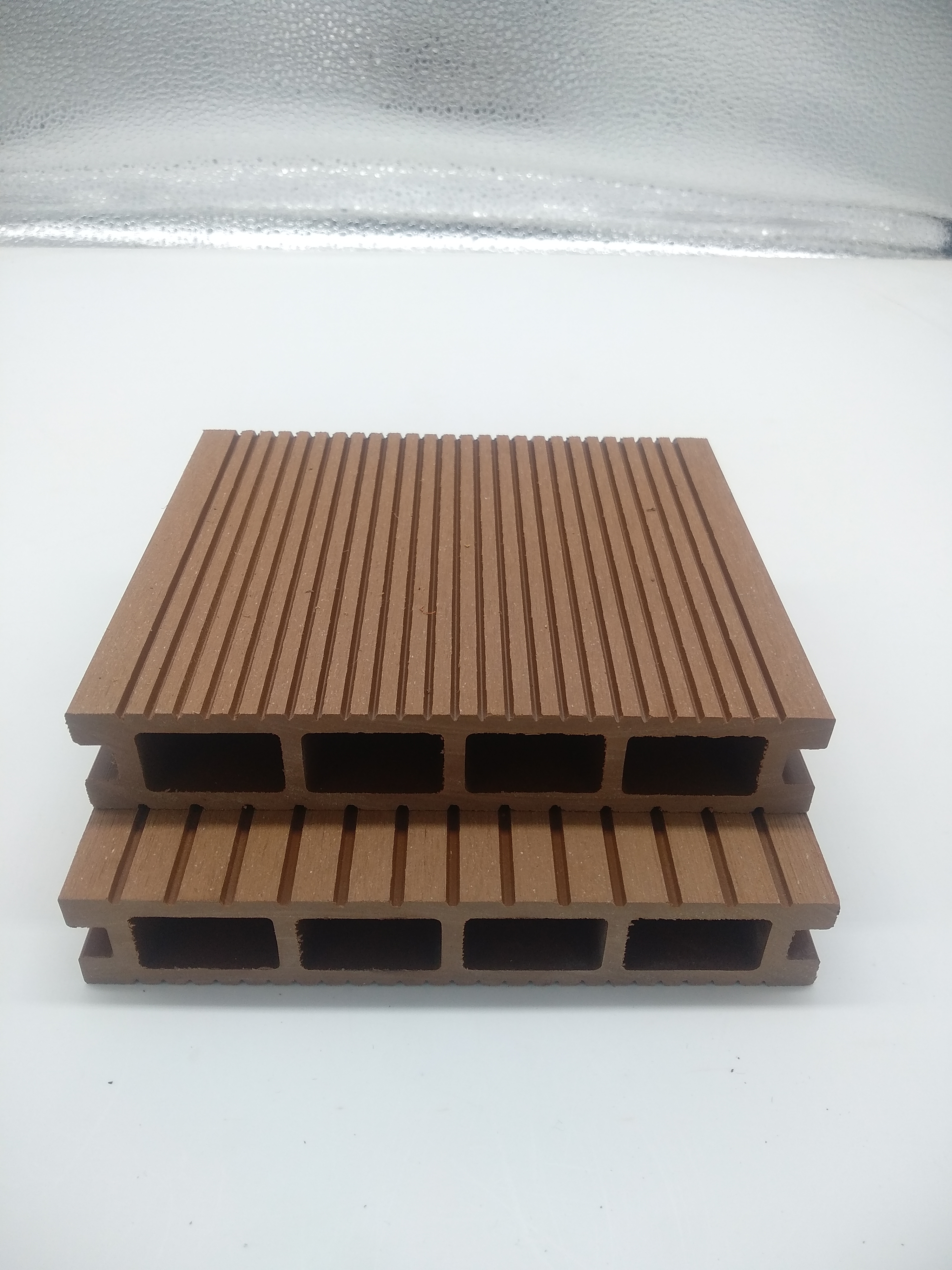 Hot outdoor waterproof striated groove square hole wood grain wood plastic flooring
