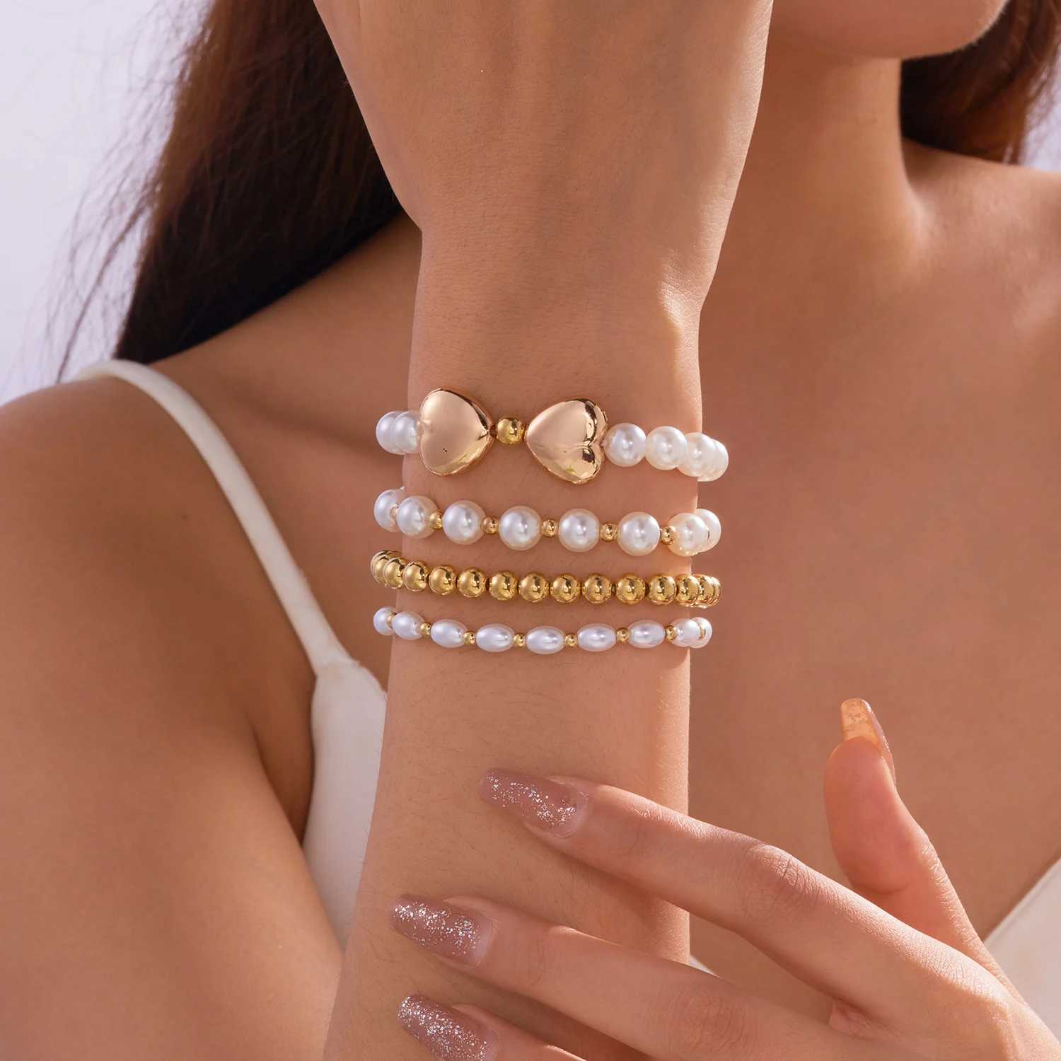 4-piece/set vintage imitation pearl handmade bead bracelet suitable for women Bohemian gold heart-shaped bow bead bracelet jewelry gift W240913