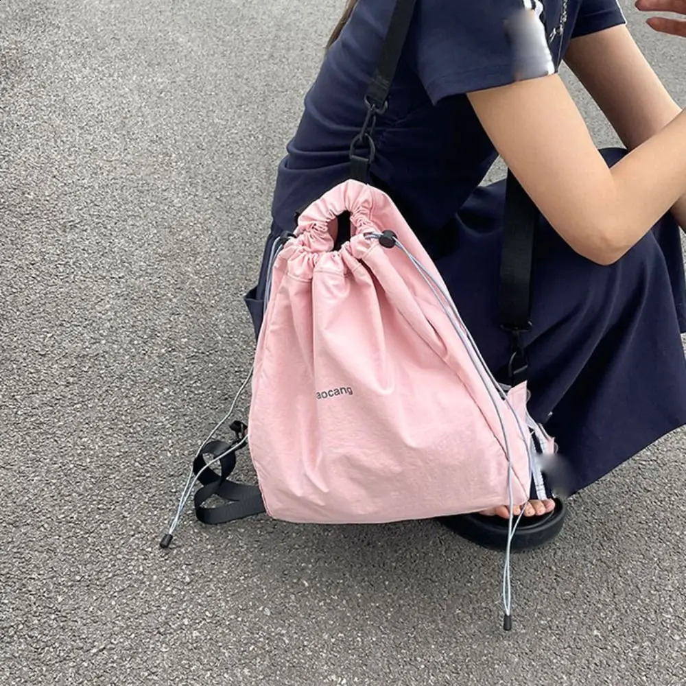 Breathable solid color drawstring backpack Korean canvas nylon backpack large capacity school backpack shoulder bag travel bag 240912