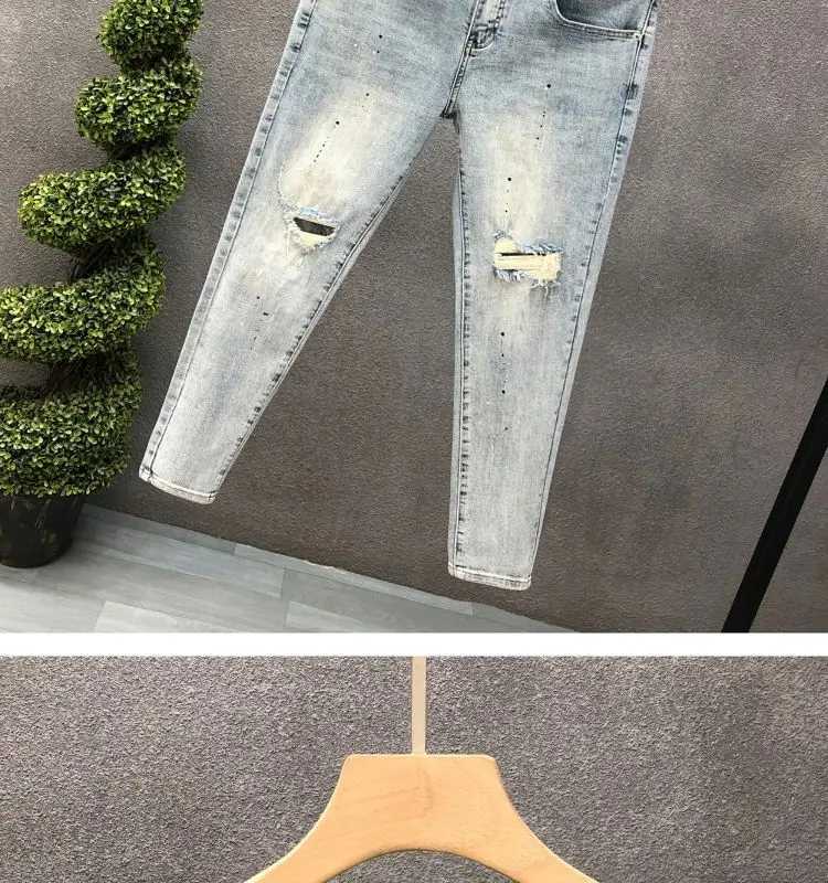 Fashion designer mens slim fit jeans with ink splatter and cracked holes suitable for spring and autumn casual wear strict fashion pencil pants CL2409